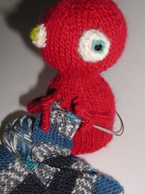 knitting, with stink eye